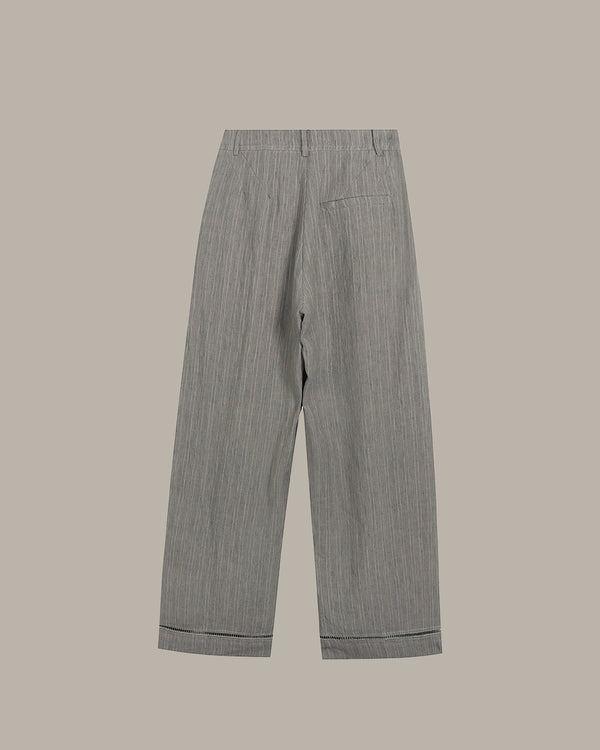 Gray striped pants on a beige background