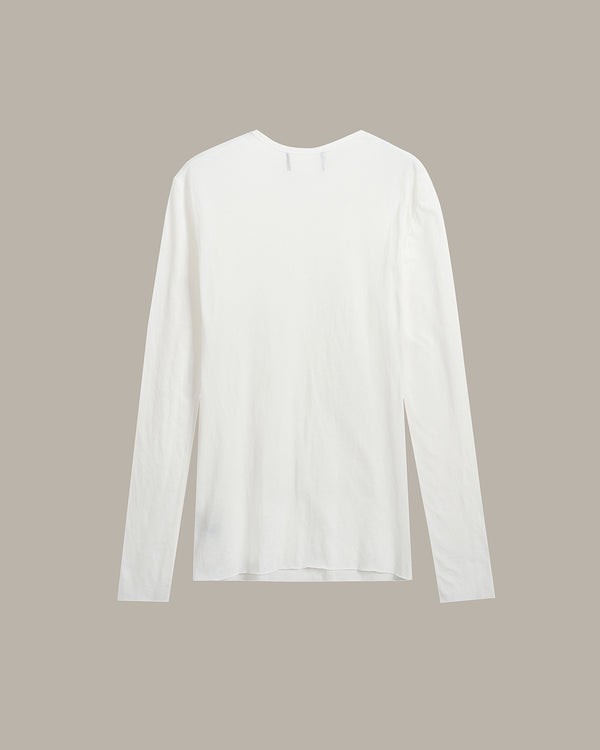 A white long-sleeve crewneck shirt displayed flat against a solid taupe background.