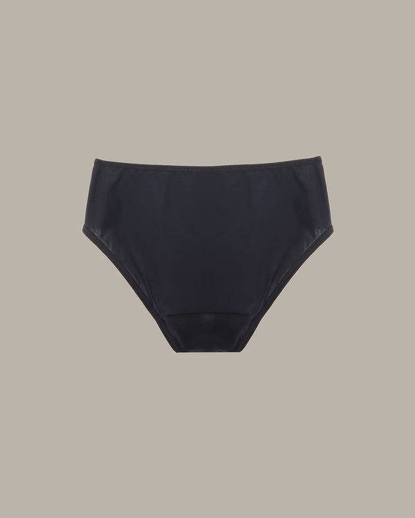 Black high-waisted bikini bottom on a beige background