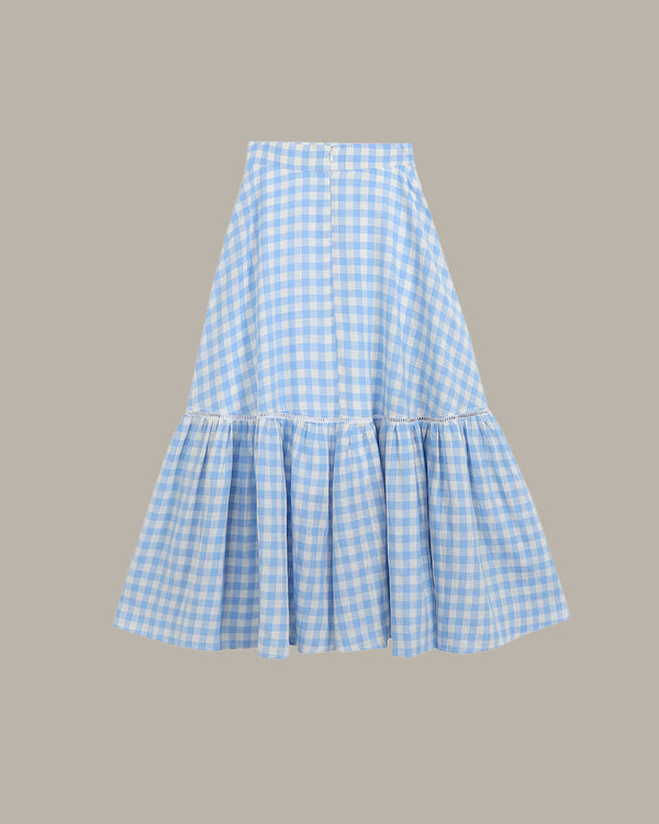 Blue and white checkered skirt on a gray background
