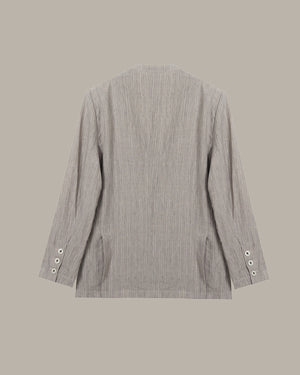 Gray striped blazer on a beige background