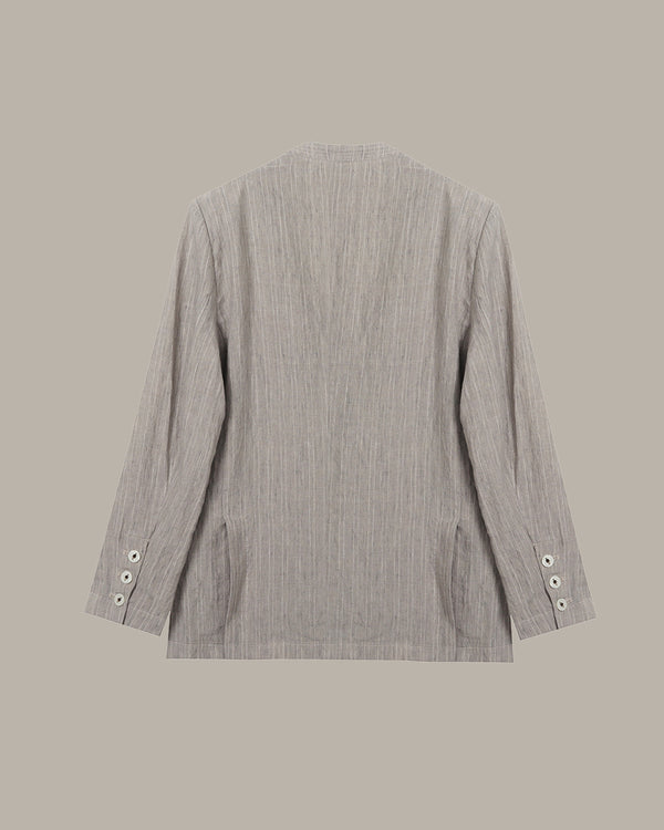 Gray striped blazer on a beige background