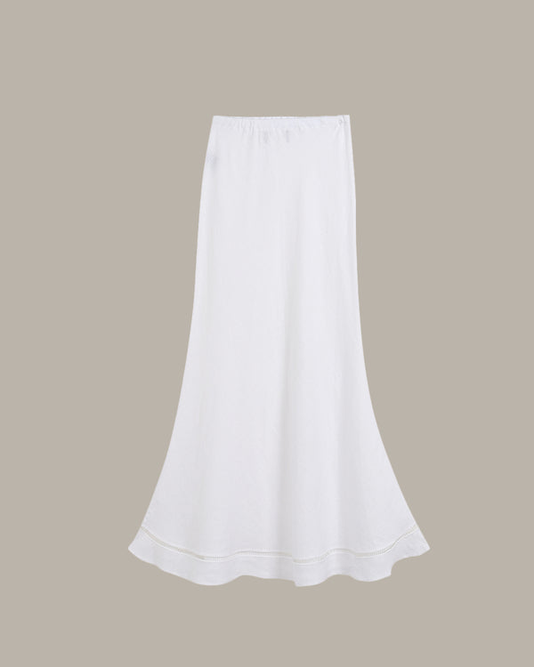 White skirt on a beige background
