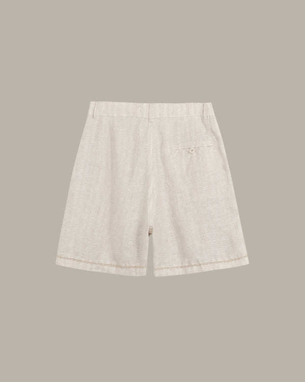 Light gray shorts on a beige background