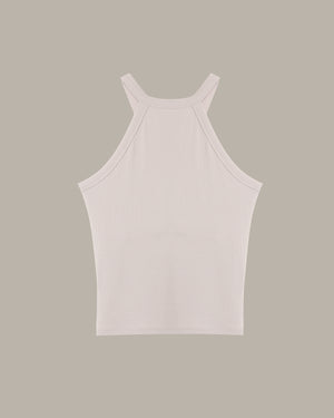 light pink tank top on a beige background