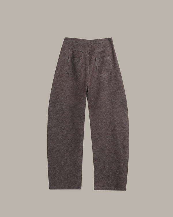 Dark gray pants on a beige background