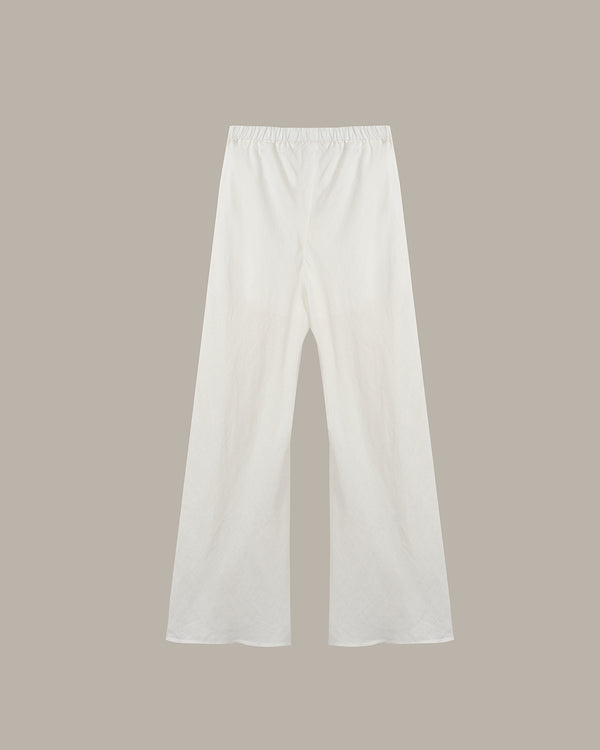 White wide-leg cropped pants with an elastic waistband, shown flat against a solid taupe background.