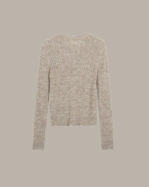 camel long-sleeve shirt on a beige background