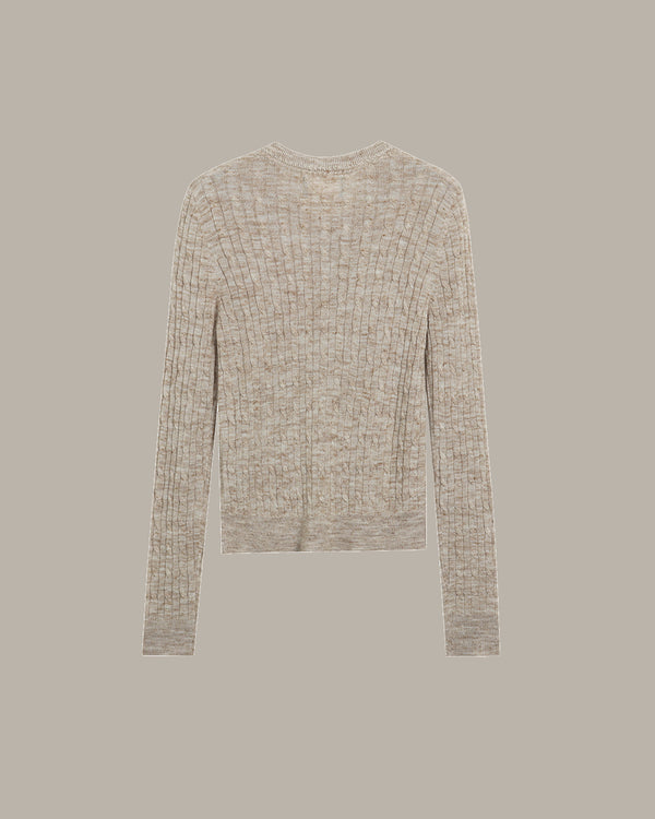 camel long-sleeve shirt on a beige background