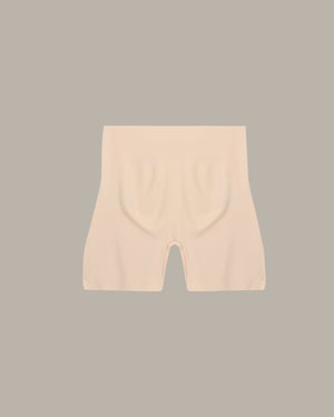 Beige shorts on a gray background