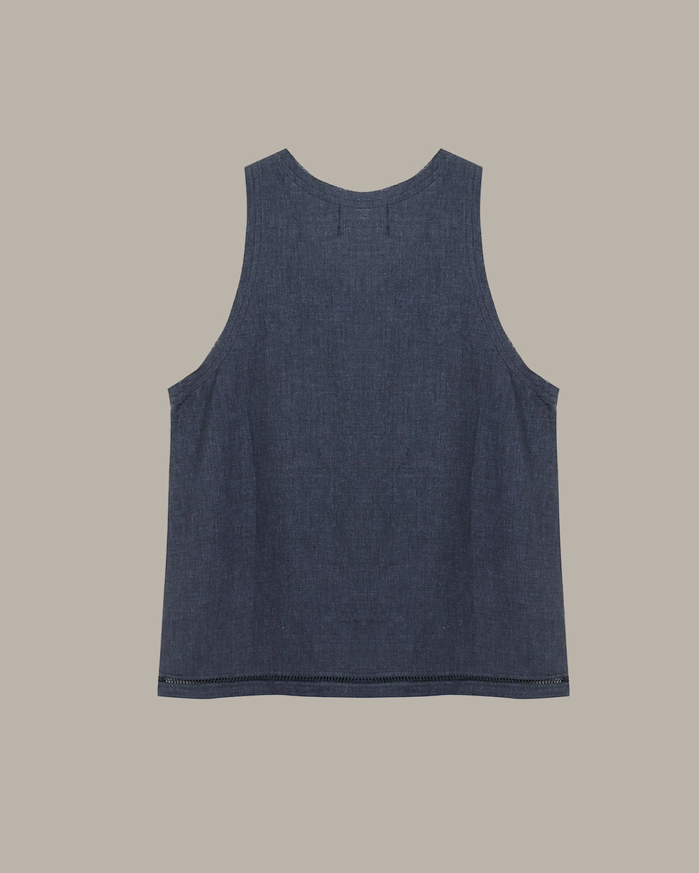 Blue tank top on a beige background