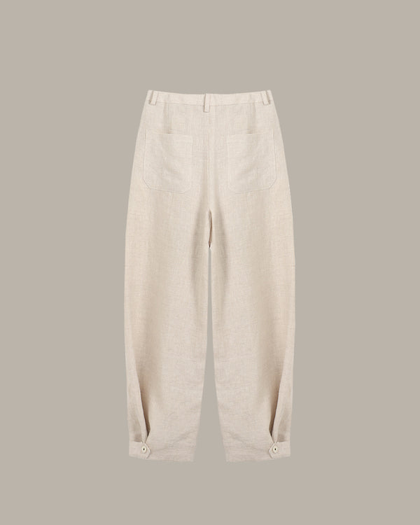 Beige pants on a gray background