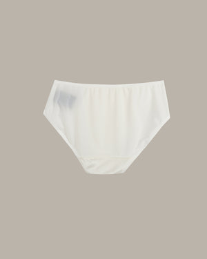 White underwear on a beige background