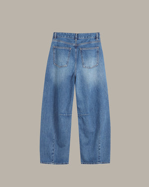 Blue jeans on a gray background