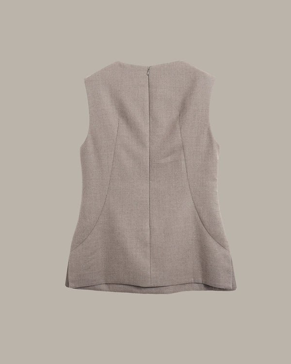 A sleeveless taupe-beige vest shown from the back, featuring a central seam and a zip closure, set against a solid taupe background.