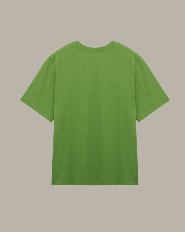 Green t-shirt on a beige background