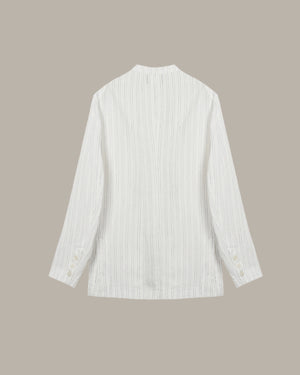 White striped shirt on a beige background