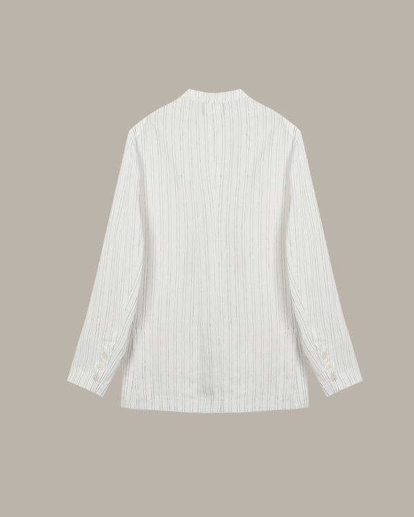 White striped shirt on a beige background