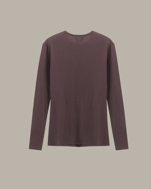 A long-sleeve crewneck t-shirt in a muted, dusty plum-brown color, displayed flat against a solid light gray background.
