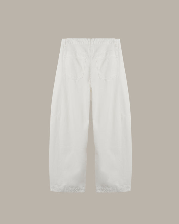 back of a White wide-leg cropped pants with a relaxed straight silhouette, shown from the back against a solid taupe background.