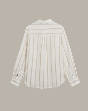 White striped shirt on a beige background