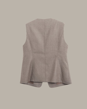 A sleeveless structured vest shown from the back, in a light taupe-beige fabric, against a solid neutral background.