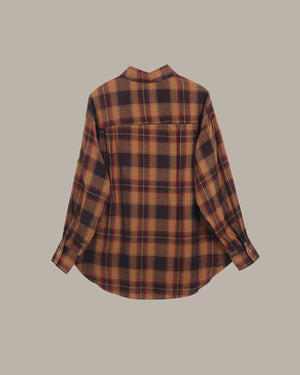 Plaid shirt on a beige background