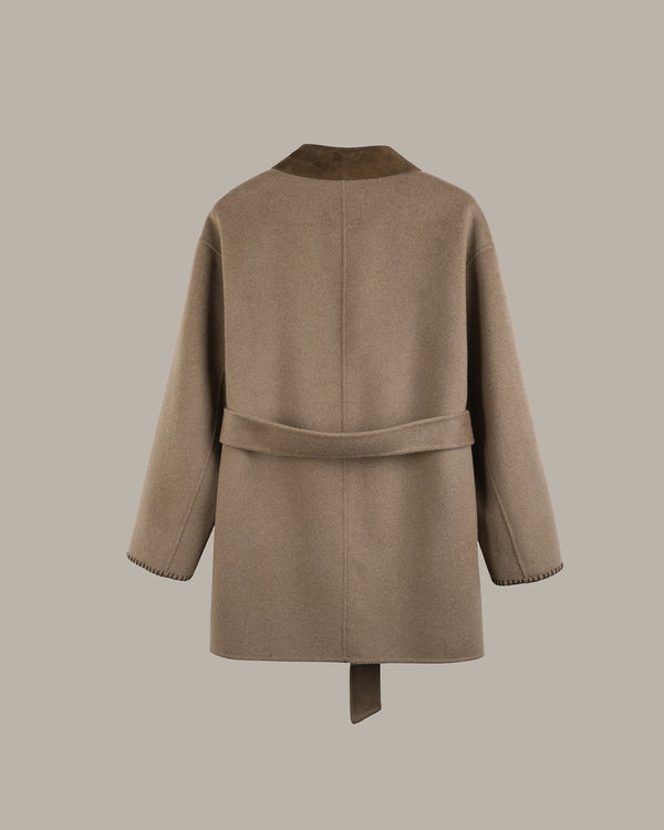A taupe-brown wool coat with a matching waist tie belt, shown from the back against a solid neutral gray background.
