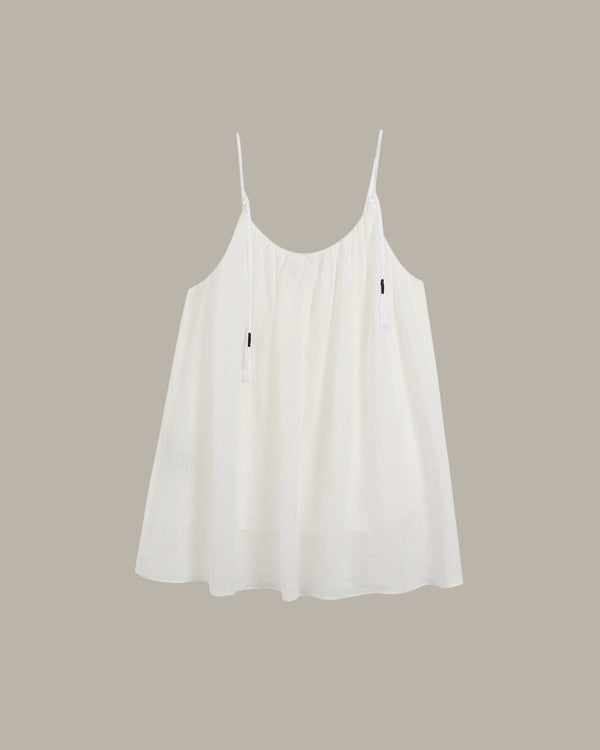 back of a White cami on a beige background