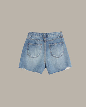 Light blue denim shorts with a high waist, frayed hem, and back pocket details, shown flat on a solid taupe background.
