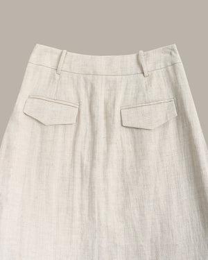 Light gray pants with two front pockets on a neutral background