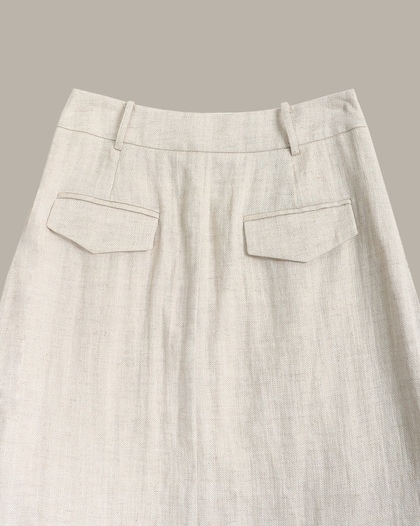 Light gray pants with two front pockets on a neutral background