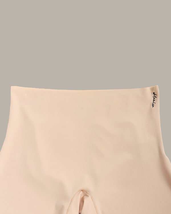 Beige sleeveless top with a brand logo on a gray background