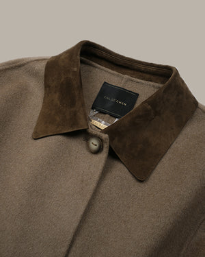 Close-up of a brown wool coat with a suede-textured collar and a visible CHLOE CHEN brand label.