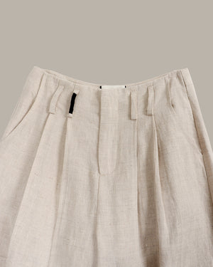 Beige pants with a plain background