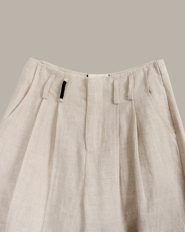 Beige pants with a plain background