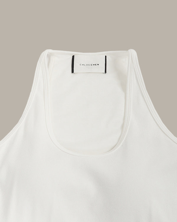 White tank top with 'CHLOECHEN' label on a beige background