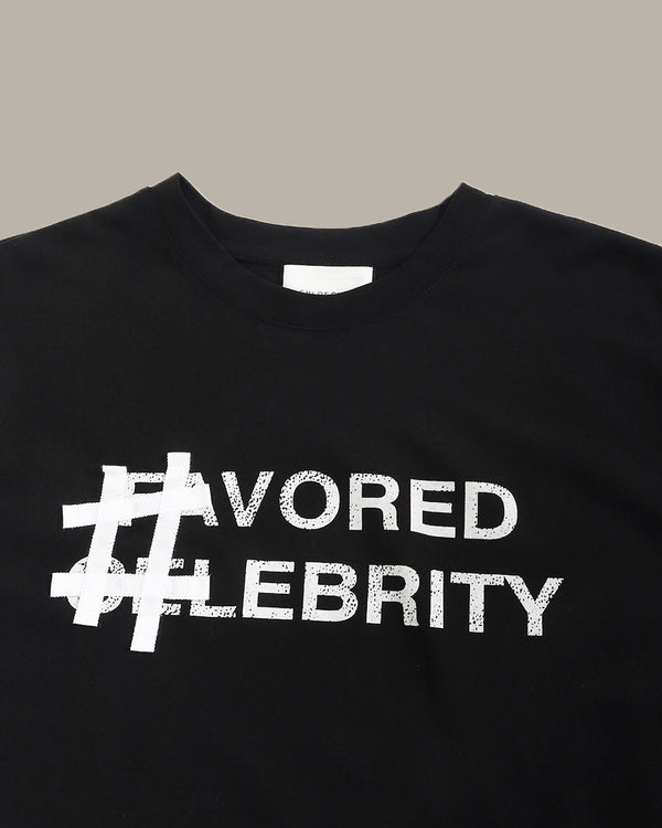 Black sweatshirt with '#favored #celebrity' text on a gray background