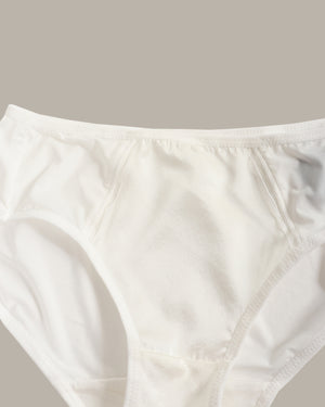 Close-up of a white underwear on a neutral background