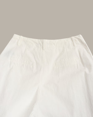 Close-up of a white fabric texture on a neutral background
