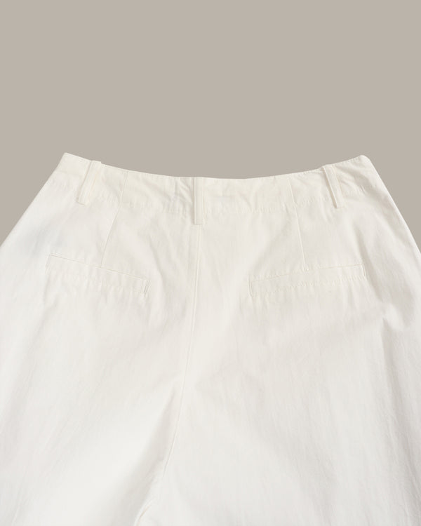 Close-up of a white fabric texture on a neutral background