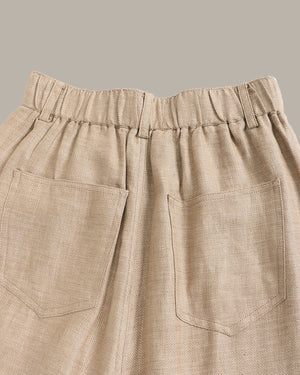 Beige pants with a plain background