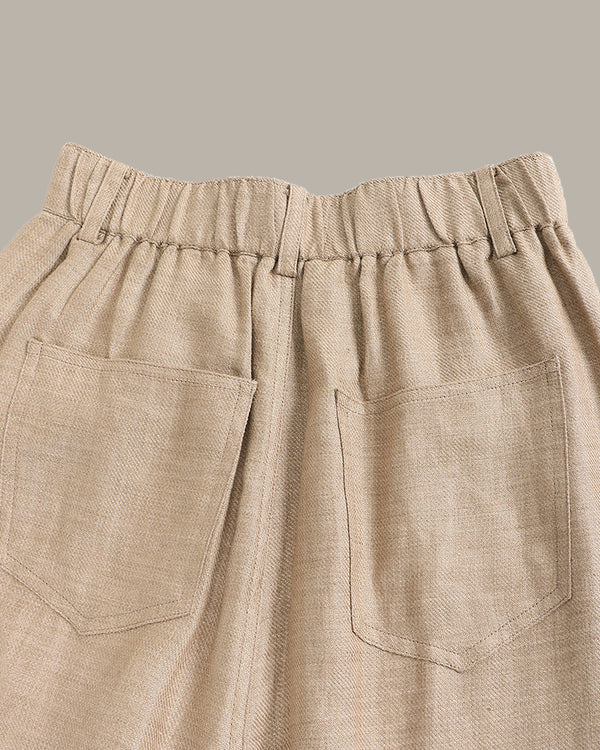 Beige pants with a plain background
