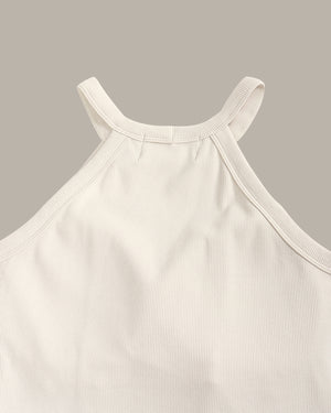 Close-up of a ribbed tank top on a gray background