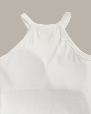 White tank top on a beige background