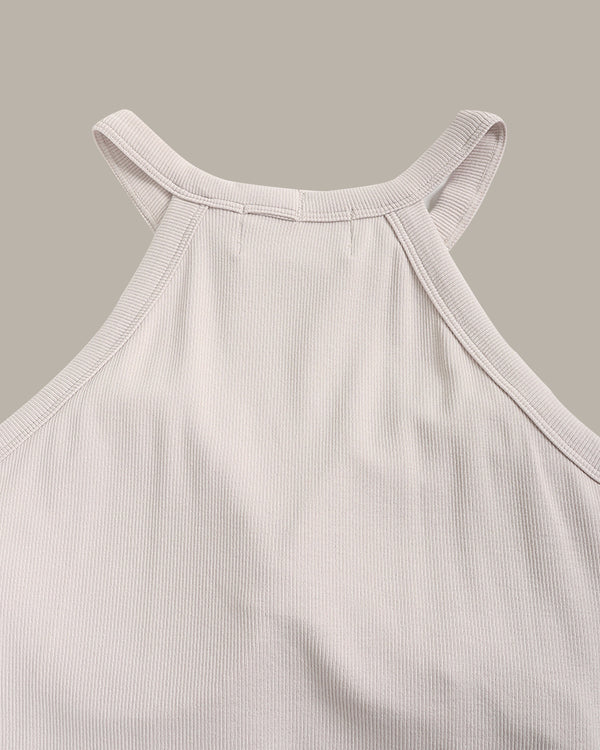 Light gray ribbed tank top on a beige background