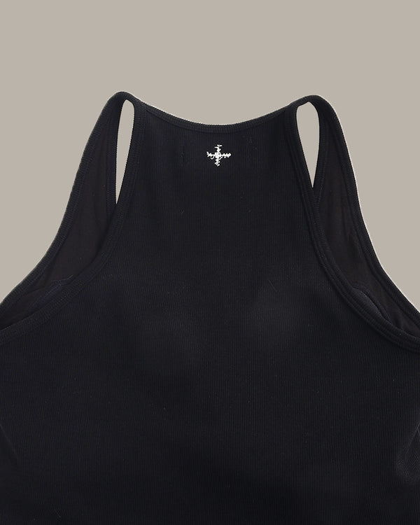 Black tank top with a small logo on the back against a beige background