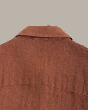 Brown jacket with a collar on a gray background