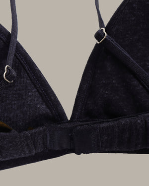 navy bralette on a beige background