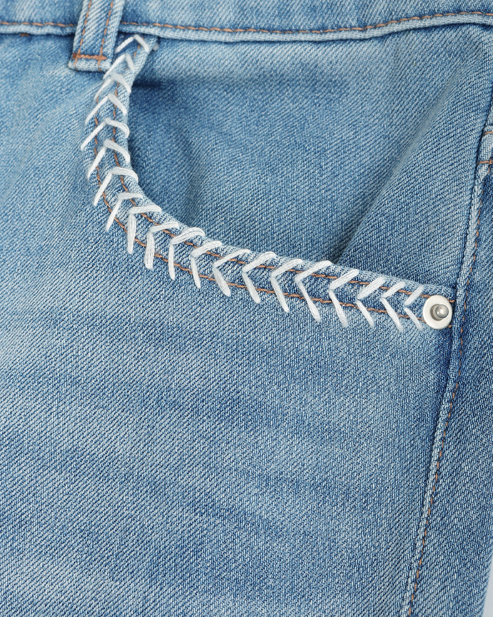 Light blue wide-leg denim jeans with decorative silver chain detailing along the pocket hems, shown flat against a solid taupe background.